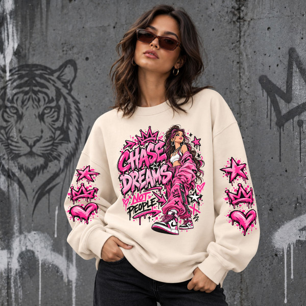 Unisex pastelinis džemperis "Chase dreams, not people"